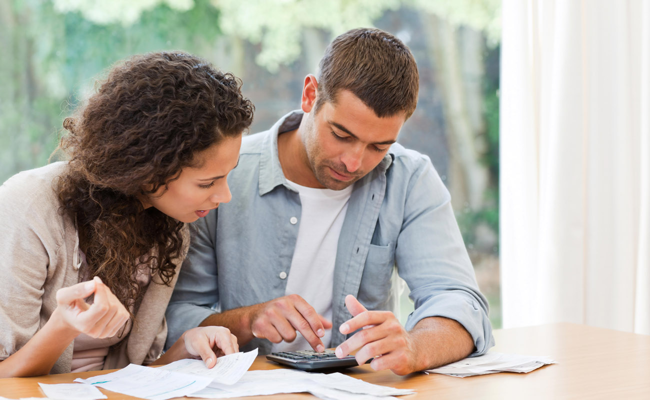 Couple doing computations.