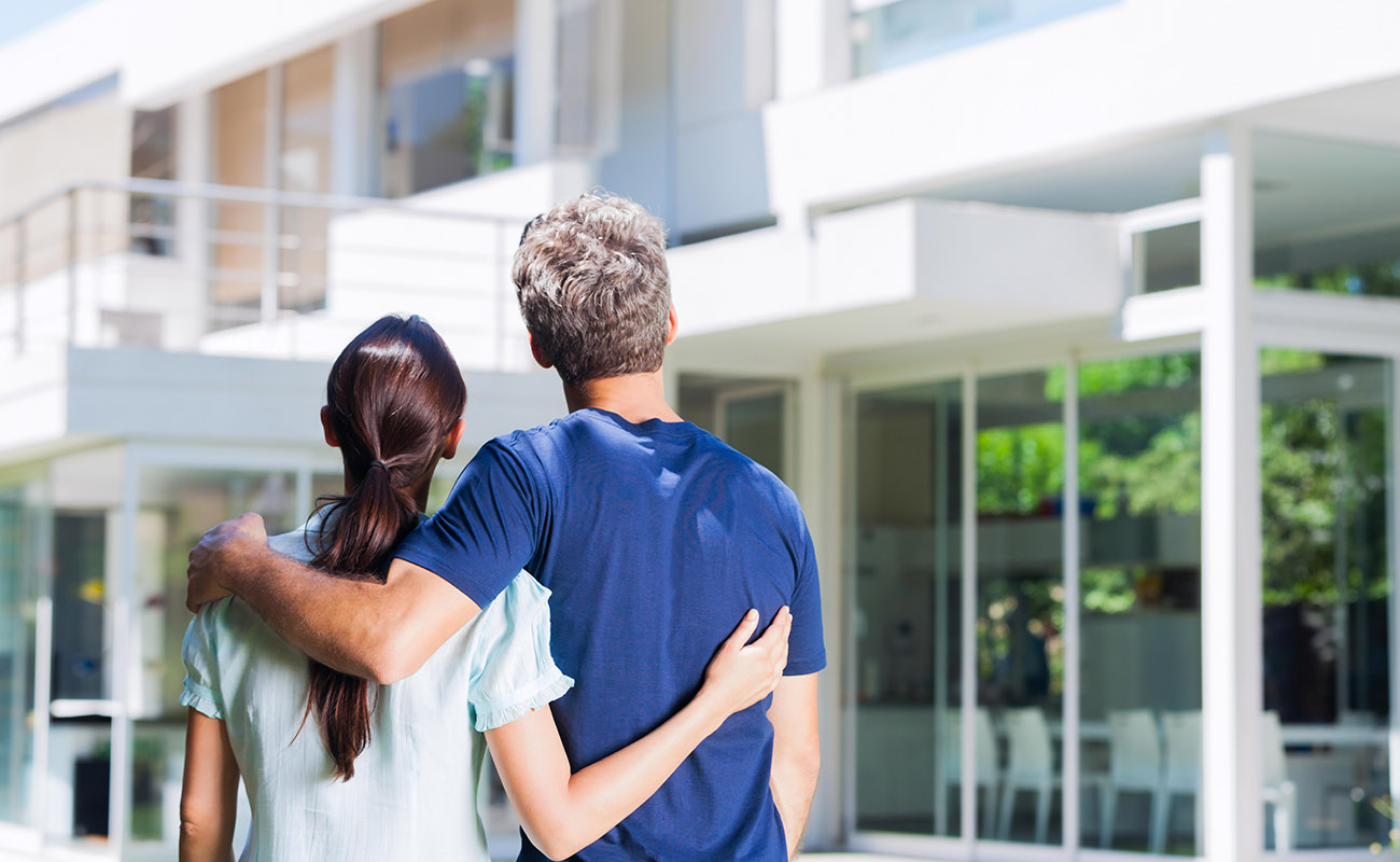 Couple looking at house for sale.