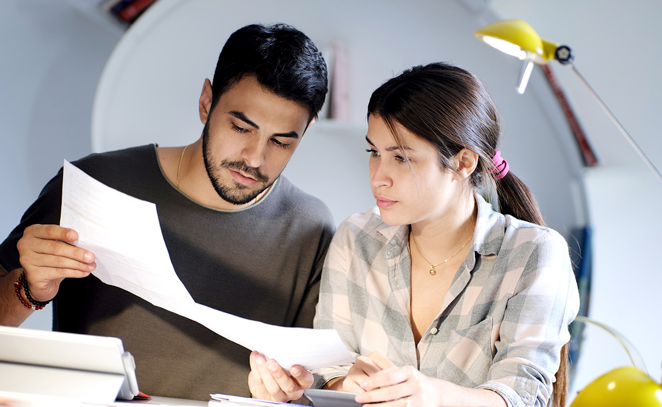 Couple managing finances.