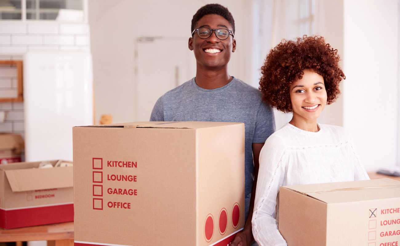 Lovely couple moving in to new apartment.