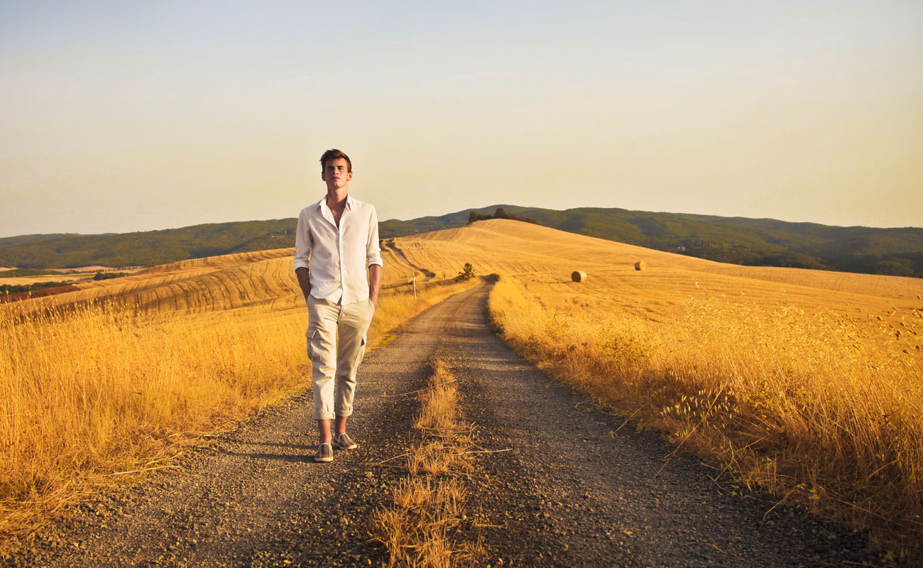 Man walking over the country.