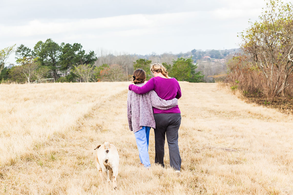 Mother and Daughter Walking.