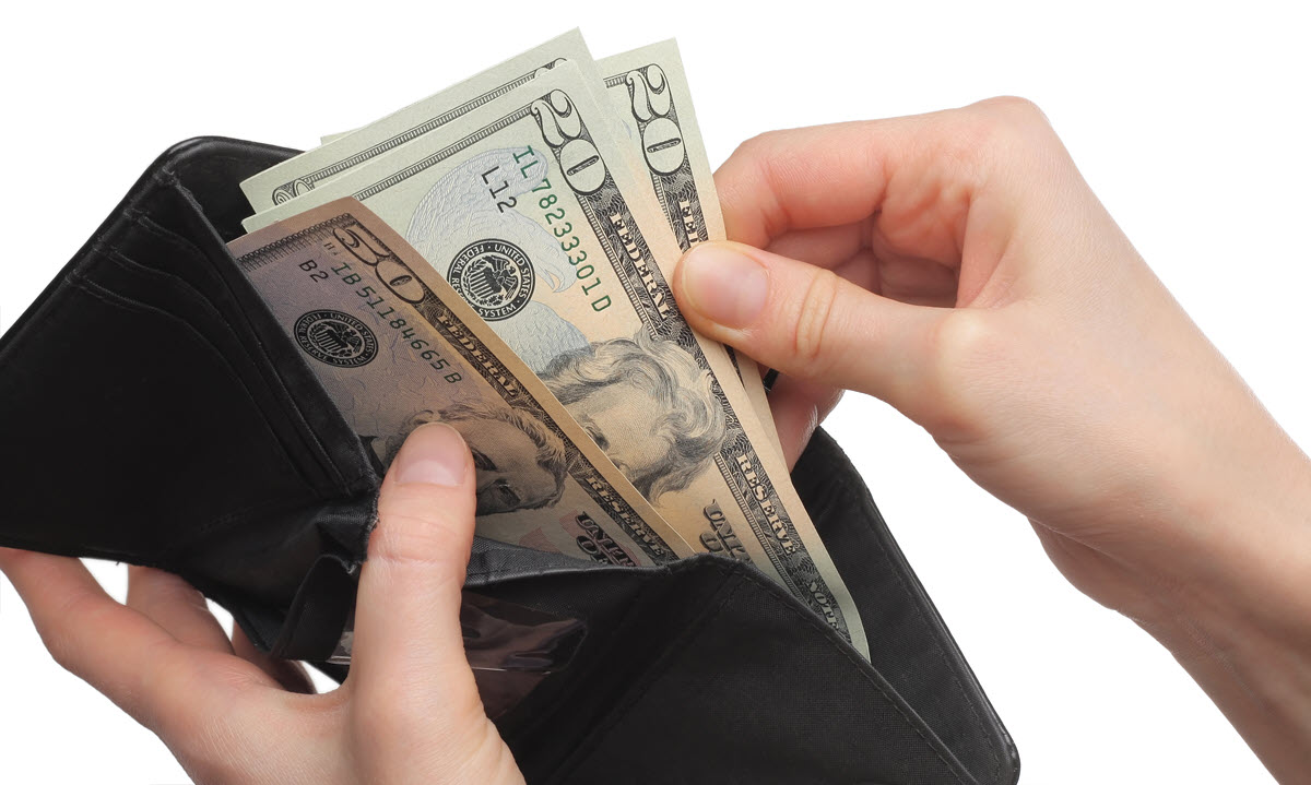 Pulling Money Out of a Wallet.