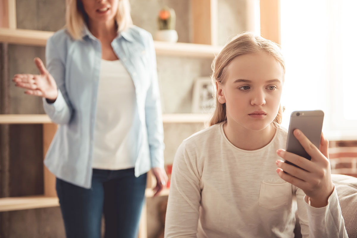 Teenage Daughter on Cell Phone.