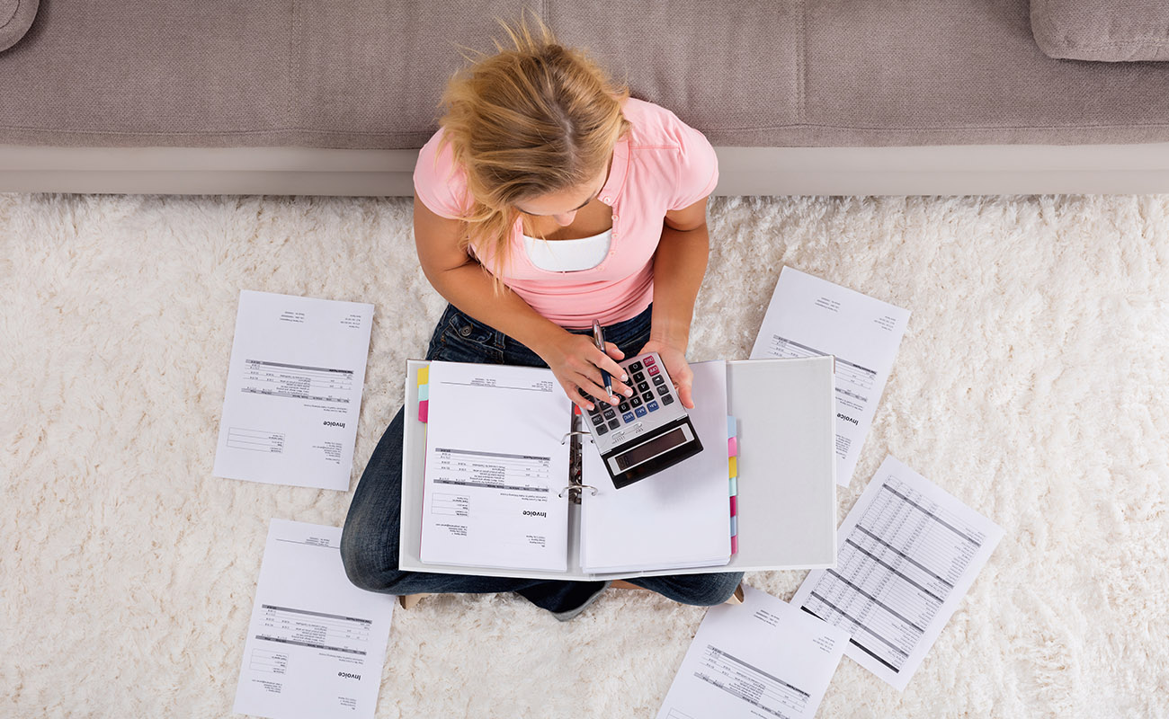 Woman doing calculations.